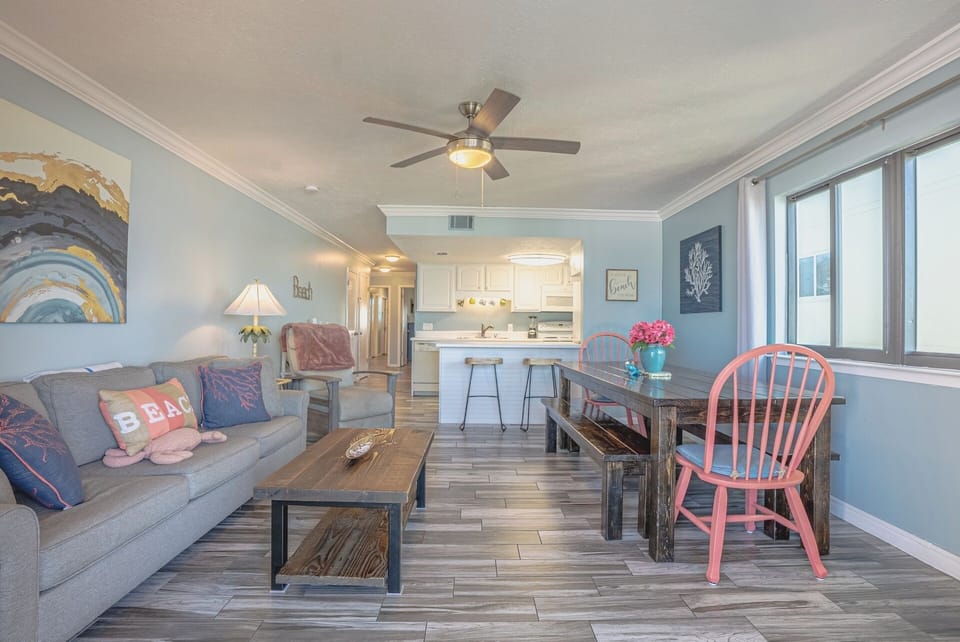 Living area with dining table and kitchen