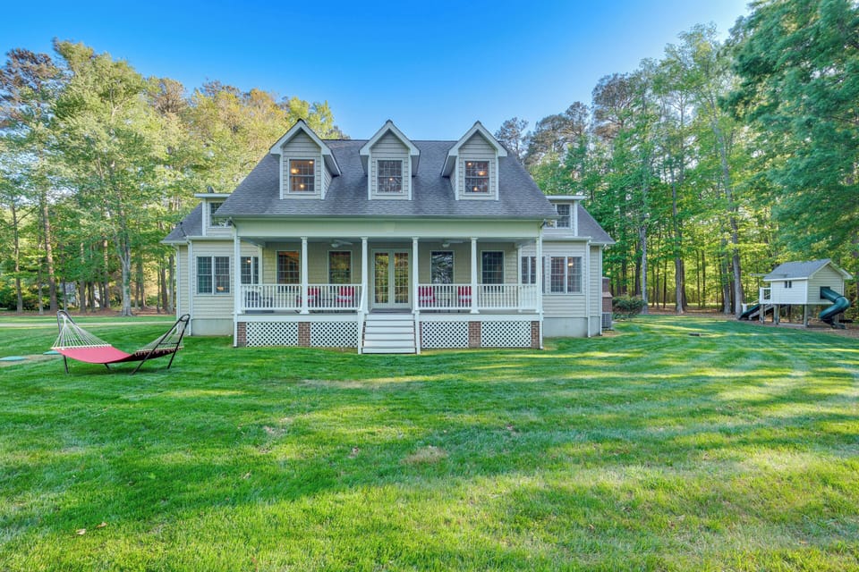 Property Exterior | Spacious Yard | Children's Playset | Free-Standing Fireplace