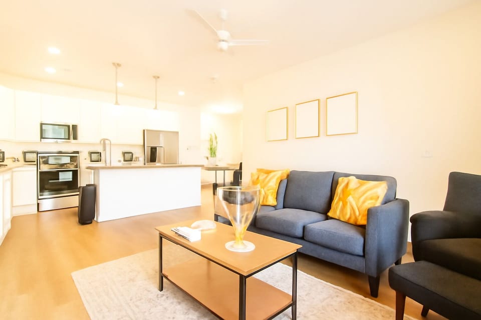Kick back and relax in this bright, cozy living room stylish décor, comfy seating, and a Smart TV perfect for Netflix nights or lazy mornings before heading to the beach!