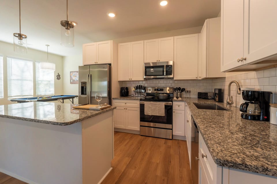 Stylish countertops and ample space to prep meals