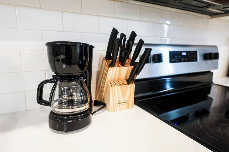 A clean, well-organized kitchen for your cooking needs.

