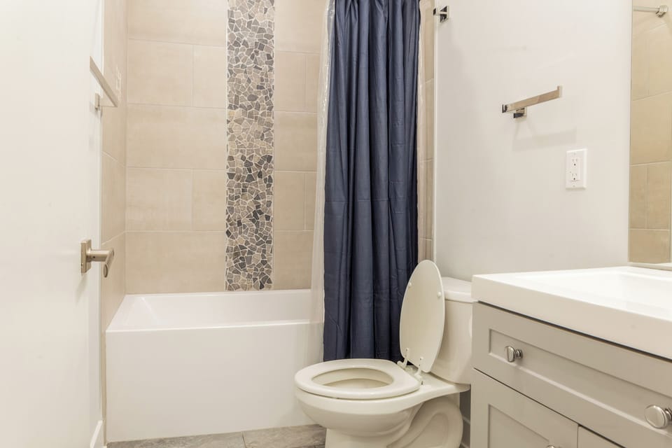 A sparkling bathroom with quality amenities.