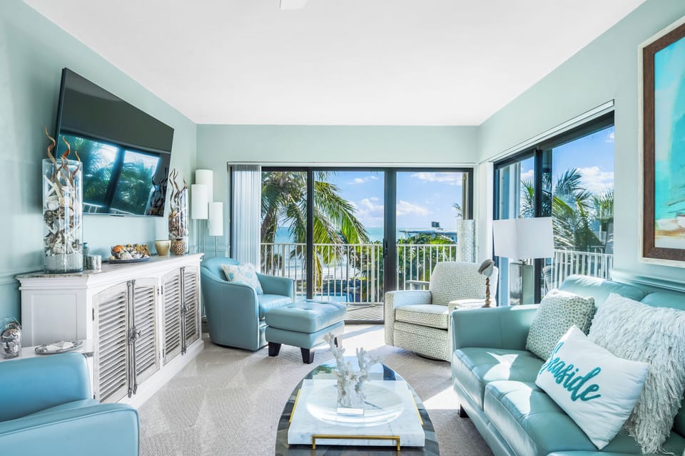 Family room with ample seating and 65 inch TV