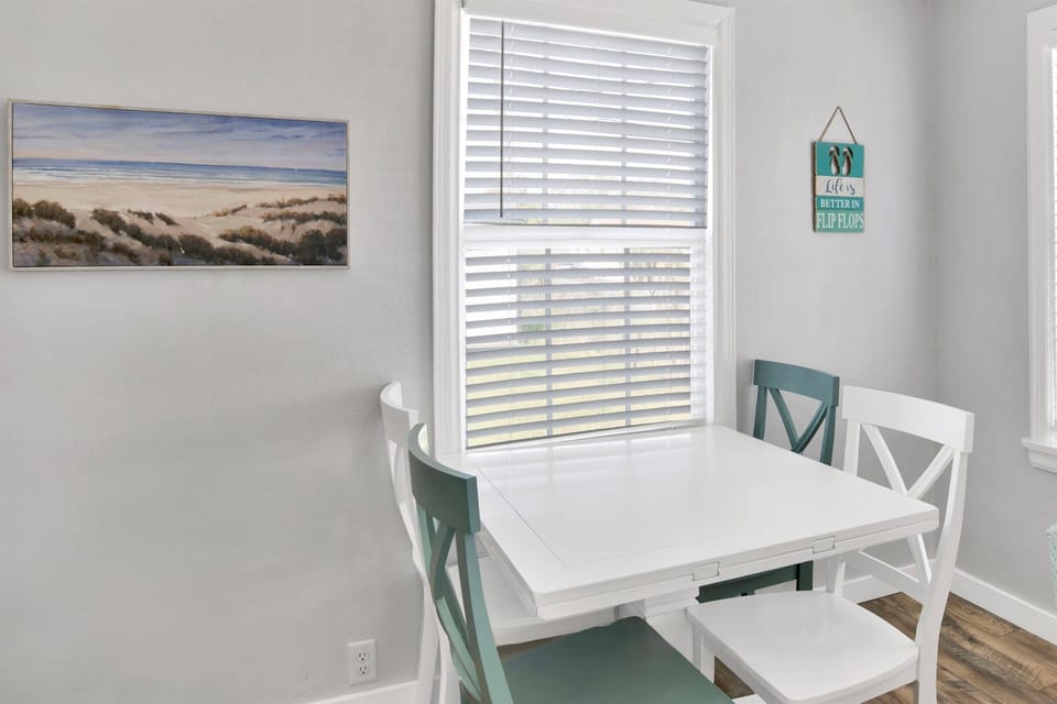 Dining table extends to accommodate 6 guests.
