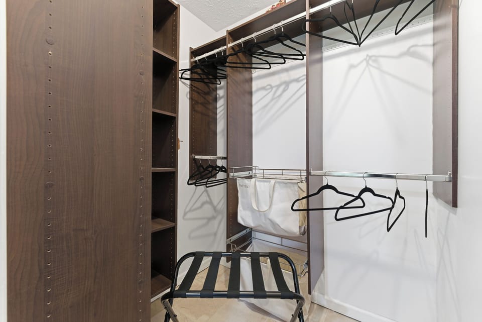 Plenty of closet space to help you settle in - luggage racks, hangers, extras