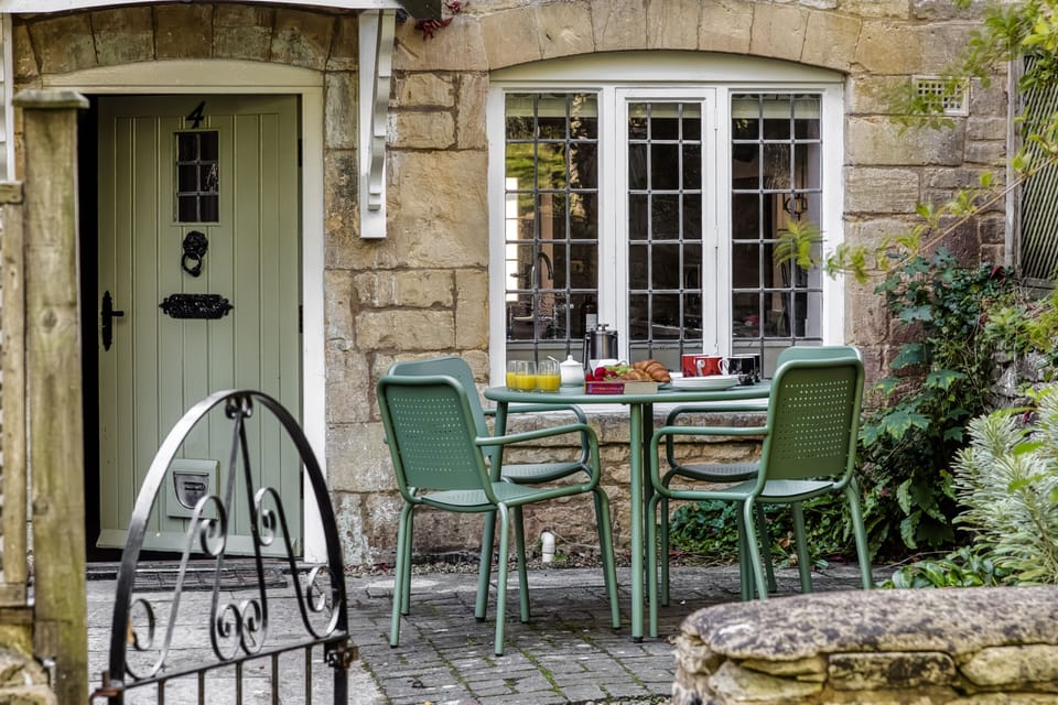 Paved terrace to the front of the property