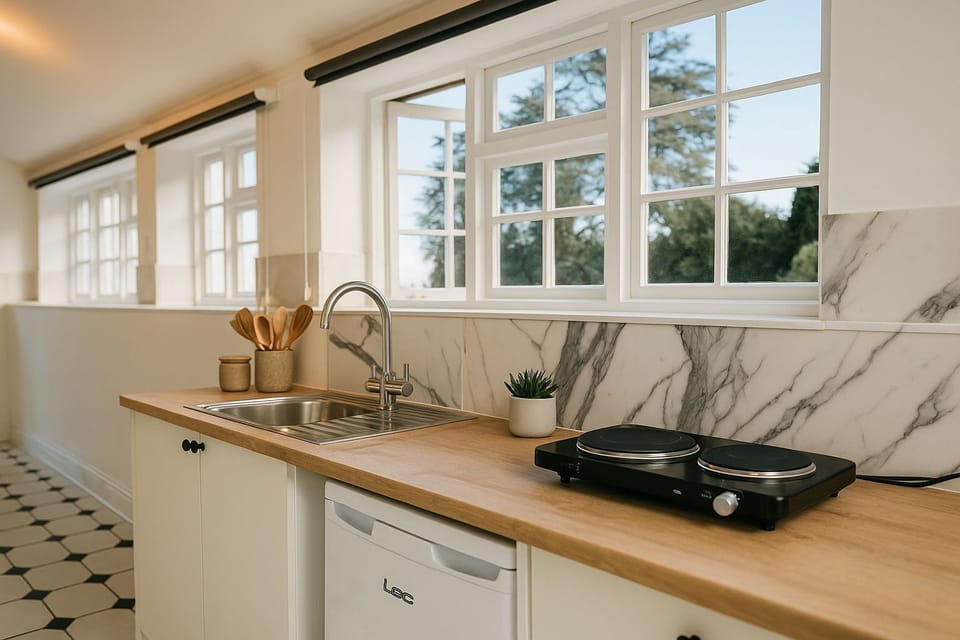 Kitchen area - store top - air fryer, fridge, toaster, kettle