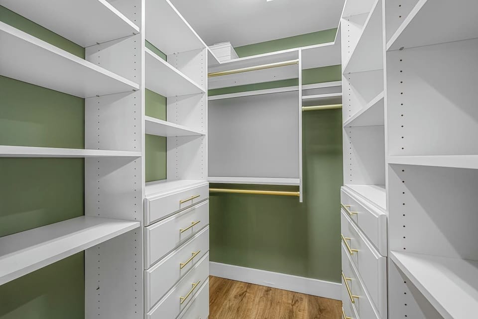 A spacious walk-in closet offering plenty of room to unpack and organize during your stay.