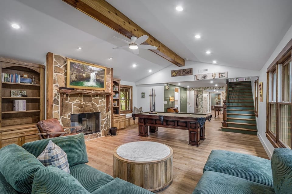 Sink into comfort by the fire, challenge your friends to pool, or binge your favorite shows—this space has it all.