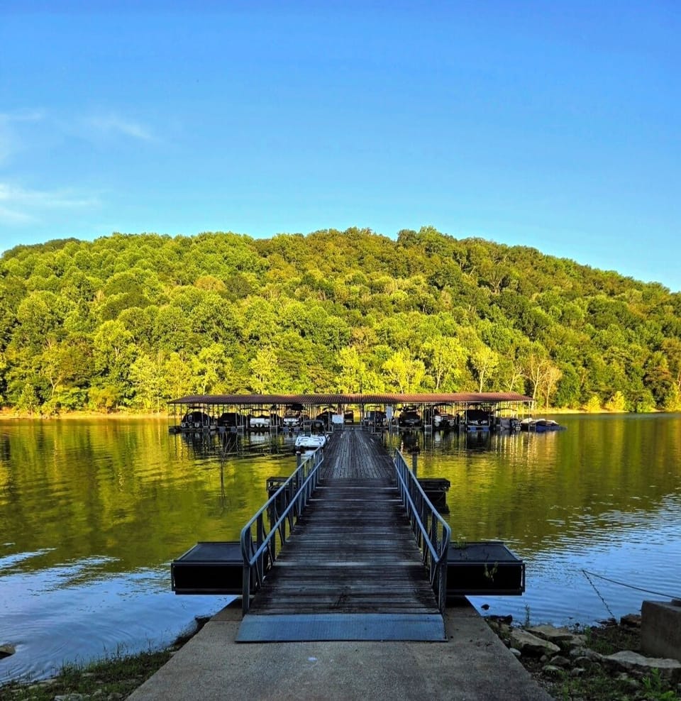 Dock lake area a short distance from the cabin in the neighborhood.