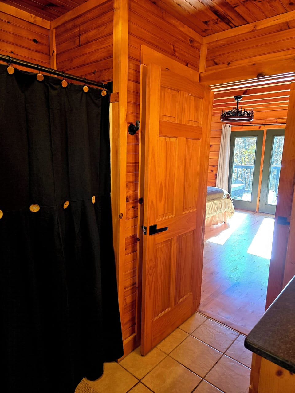 Bathroom connected to main level bedroom. Shower bath combo .