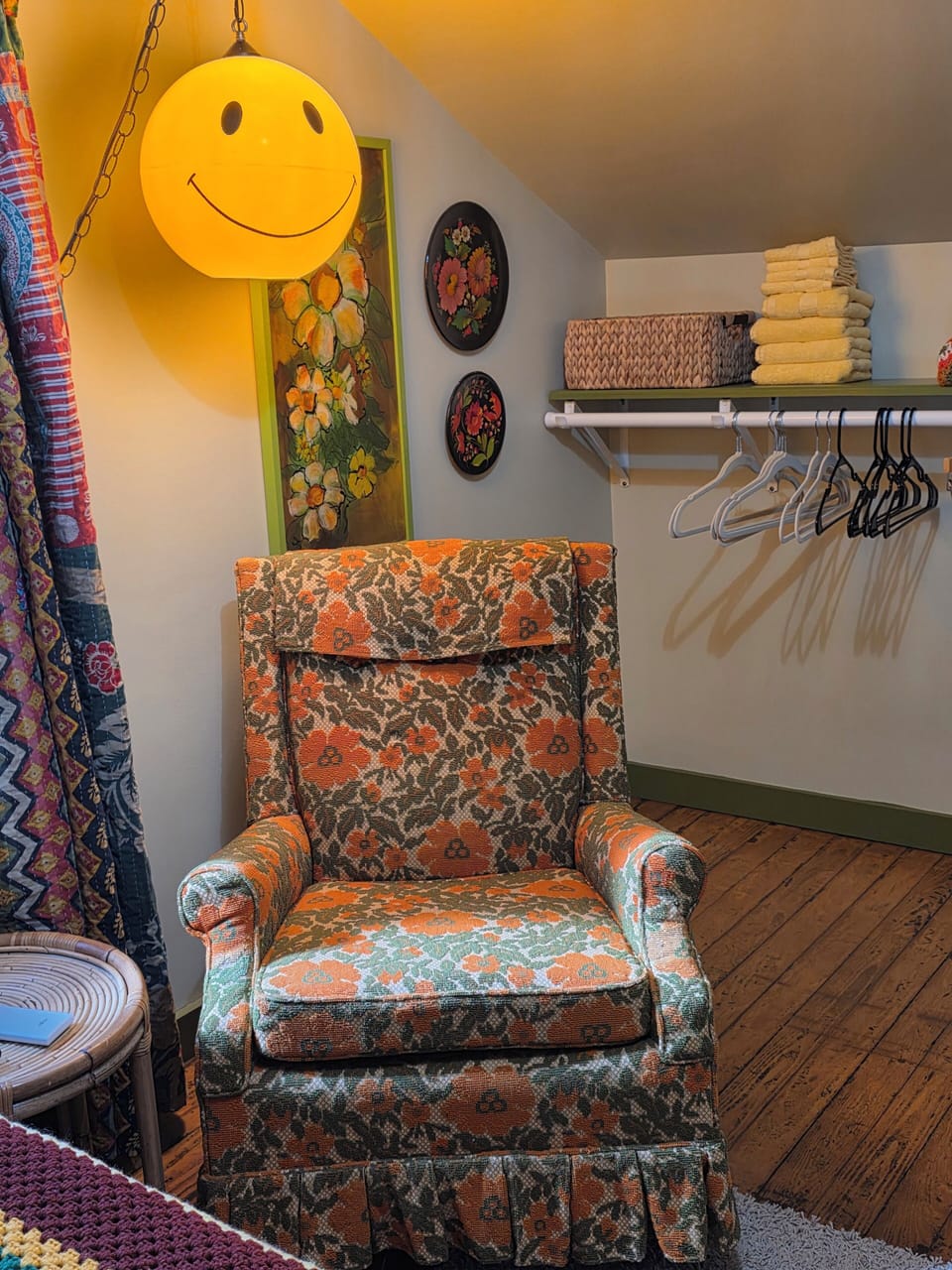 That 70s room open closet, reading nook, the chair rocks and swivels, table.  