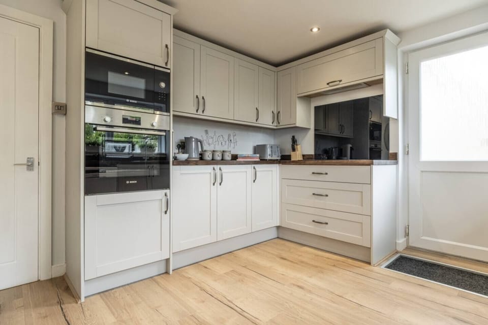 Spacious kitchen with all essential appliances