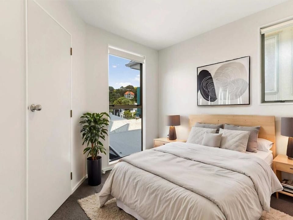 Spacious bedroom with elegant touches and natural light