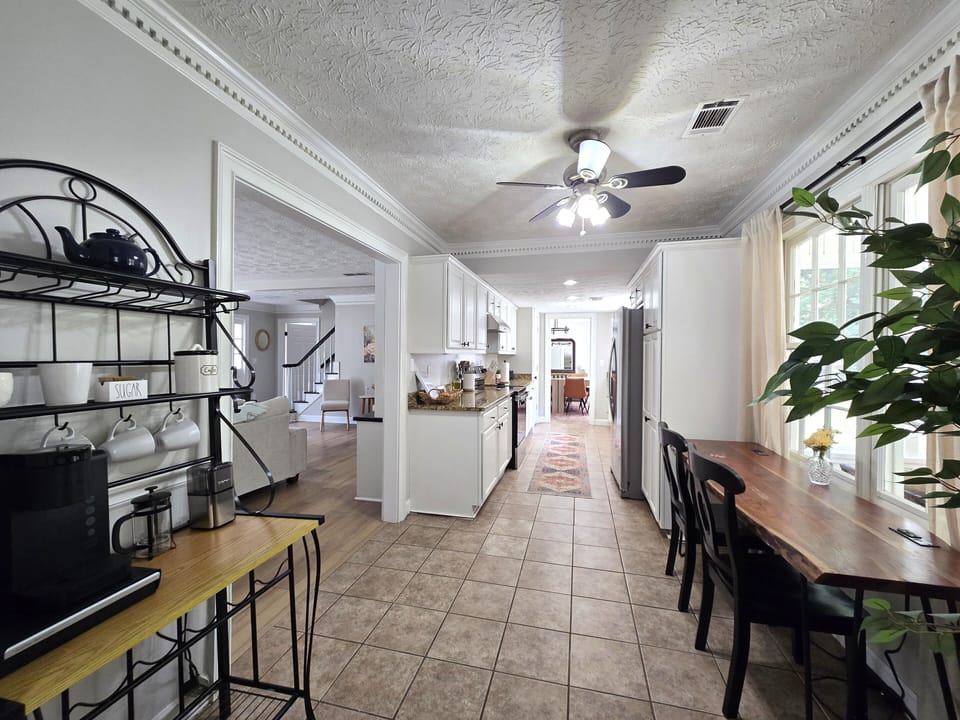 Full view of kitchen and coffee/desk nook