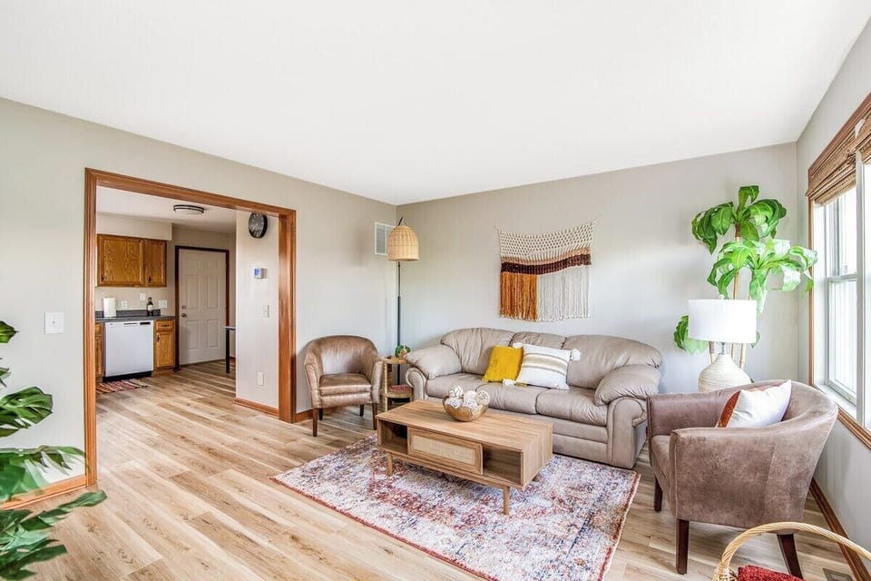 The living room is right off of the kitchen
