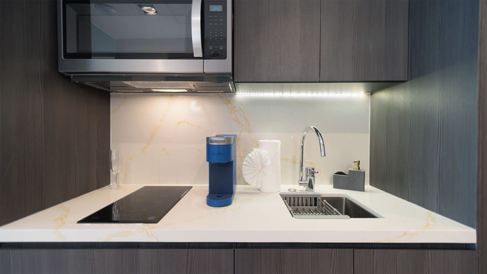 sink, microwave, coffee maker