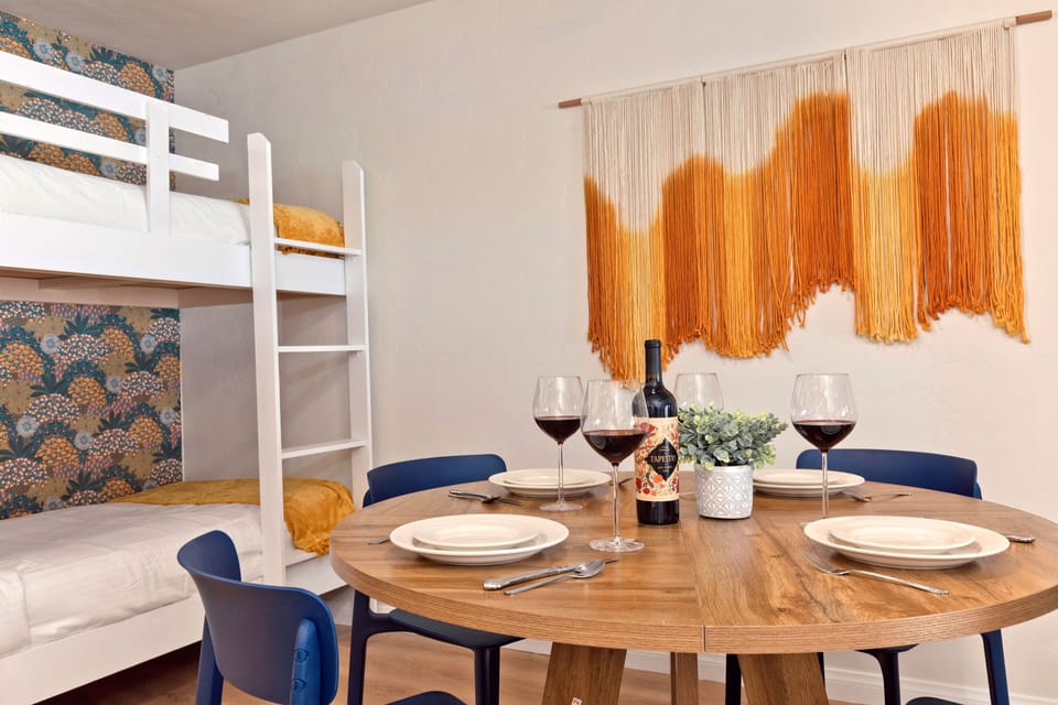 Gather for shared meals or game night at the spacious dining table. 