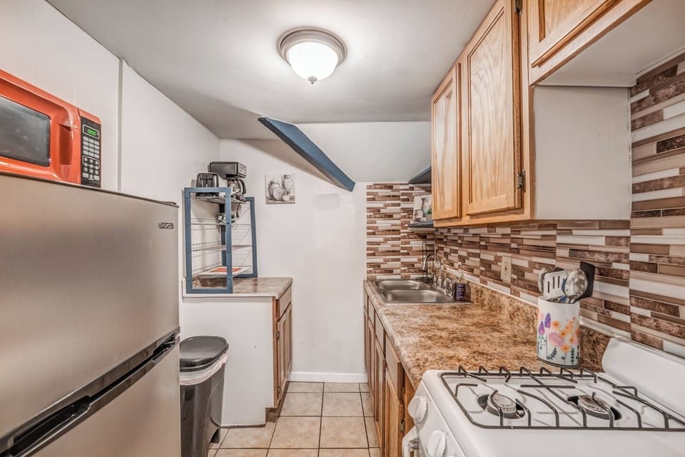 Cook your favorite meals with ease in this well-equipped kitchen.