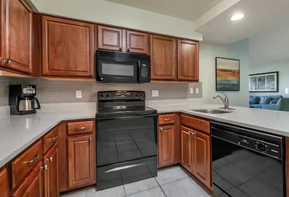 Full kitchen equipped with the basics you may need to prepare a meal in-room
