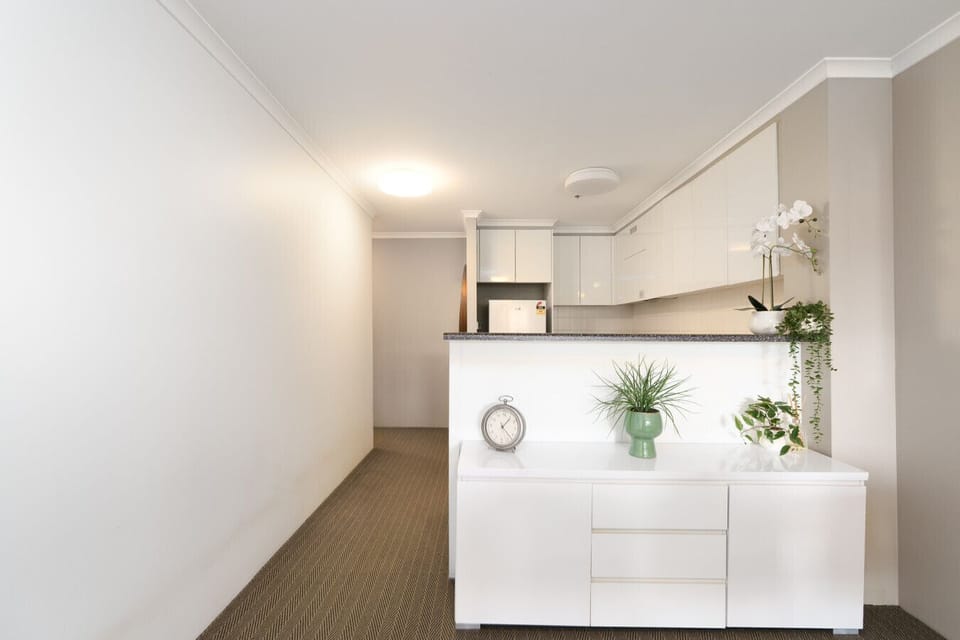 Styled with modern accents and cozy details that make the space feel inviting and polished.