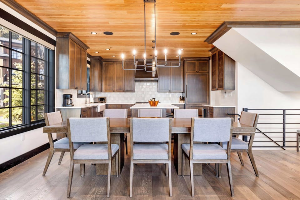 Dining area (main floor): Table seating for 10, connected to kitchen and living room