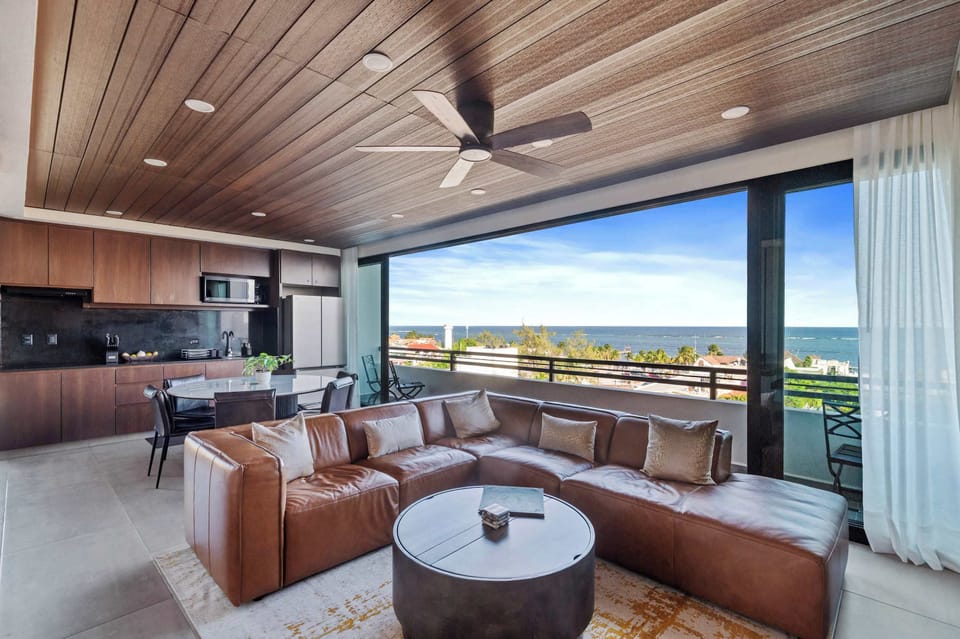 Spacious living room with ocean views and elegant design
