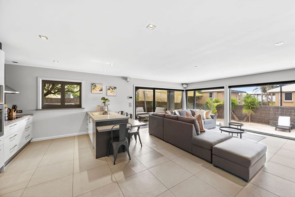 The spacious fully equipped downstairs kitchen allows you to spend the day around the pool and feed everyone!