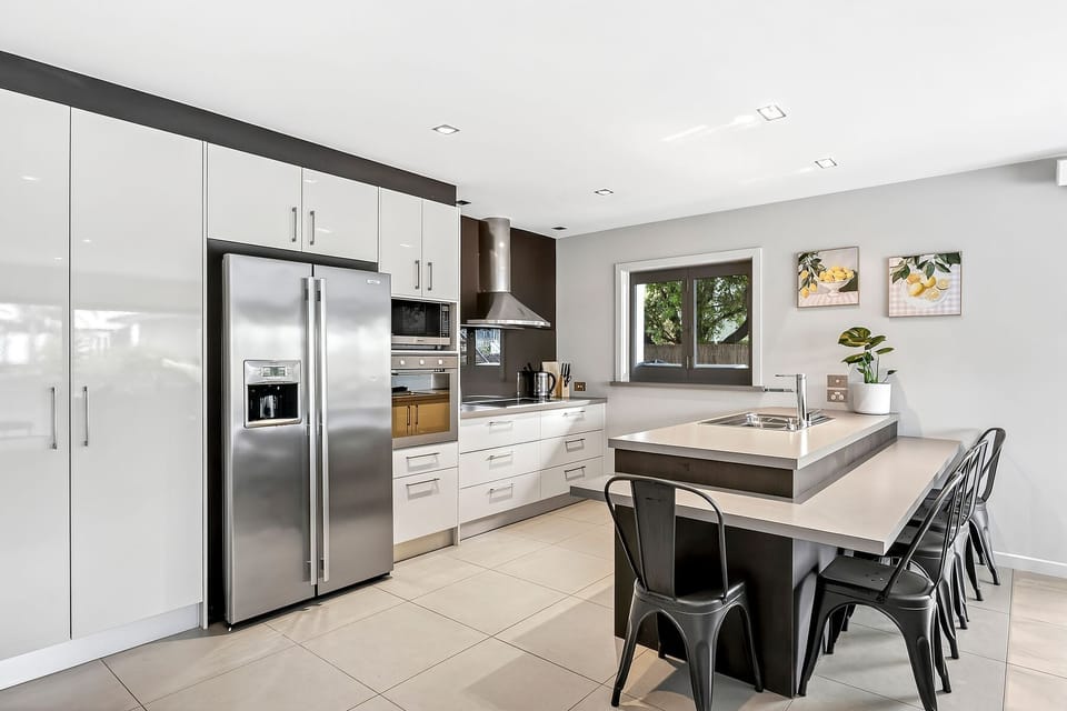 Downstairs kitchen overlooking pool