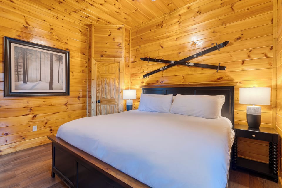 Bedroom 3 features a king bed and a TV.