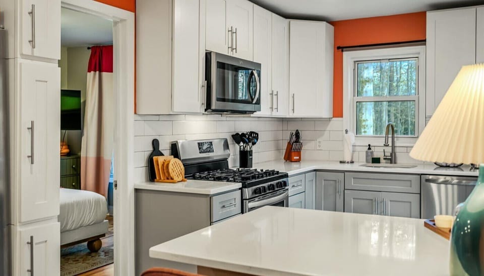 Open, bright, and ready to serve—our kitchen is basically an invitation to gather, laugh, and eat your way through vacation.