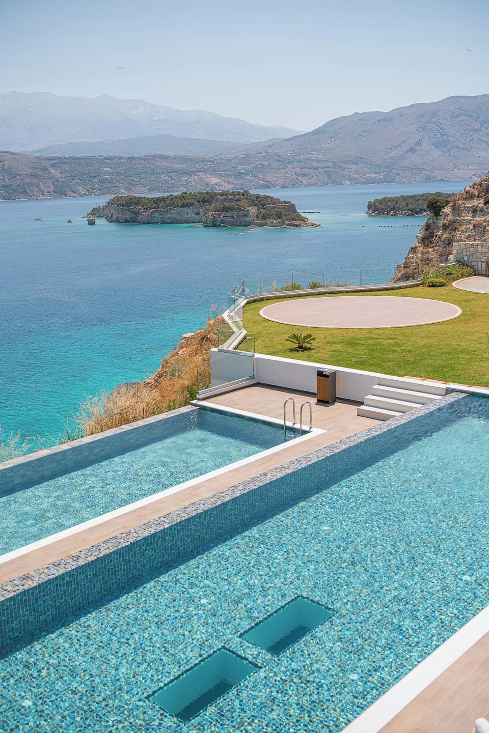 Two private swimming pools: Main pool (175 m²) and secondary pool (52 m², 1.3 m depth, heated upon request with an additional charge)