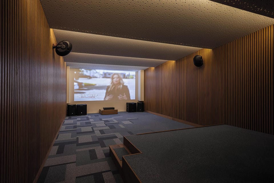 Private cinema room with PlayStation 5 and high-quality sound system