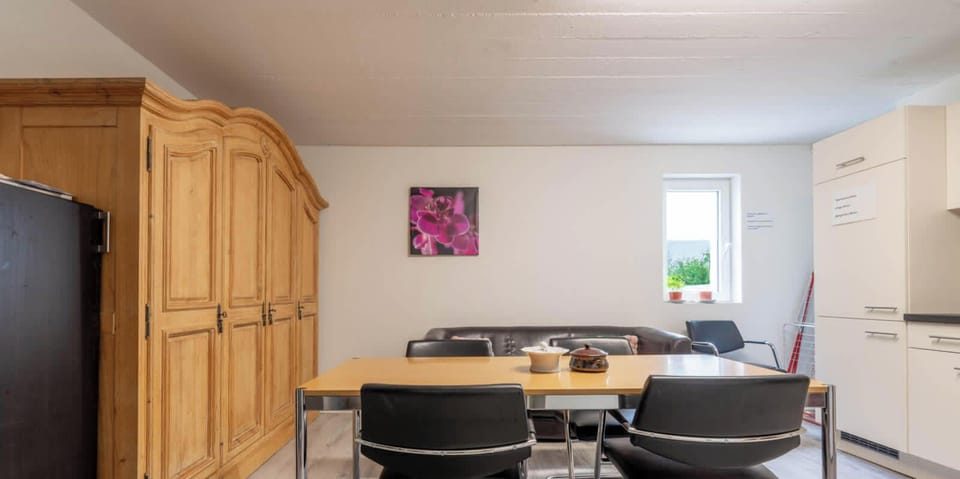 Fully equipped shared kitchen with dining table