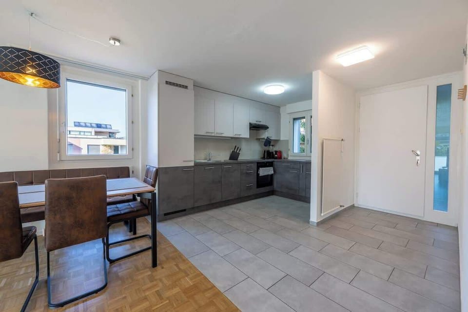 Open-plan kitchen and dining area with modern layout