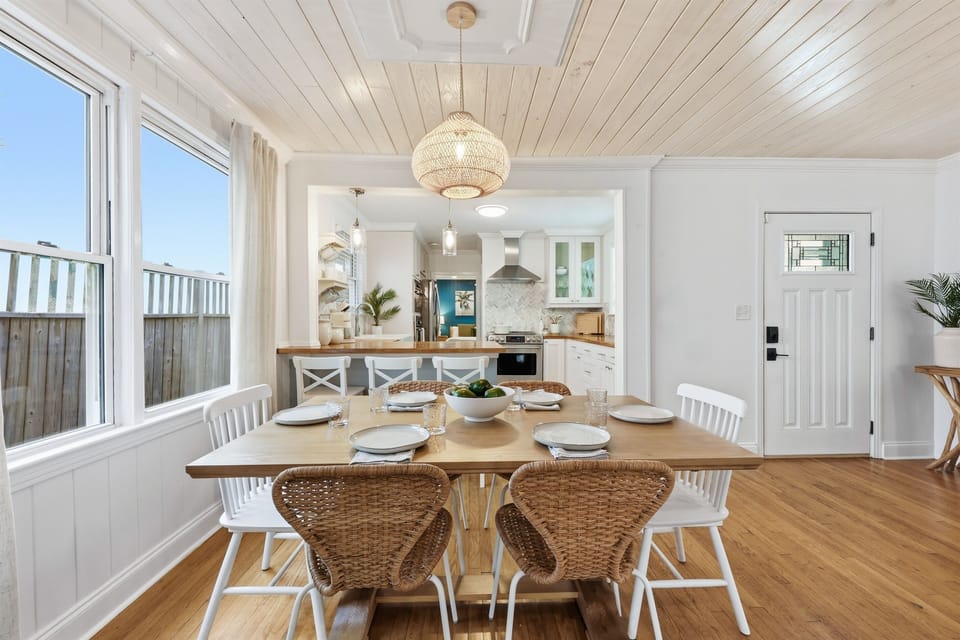 Gather around the table, enjoy the natural light, and flow seamlessly into the beautifully updated kitchen just beyond. Coastal comfort, right at home.
