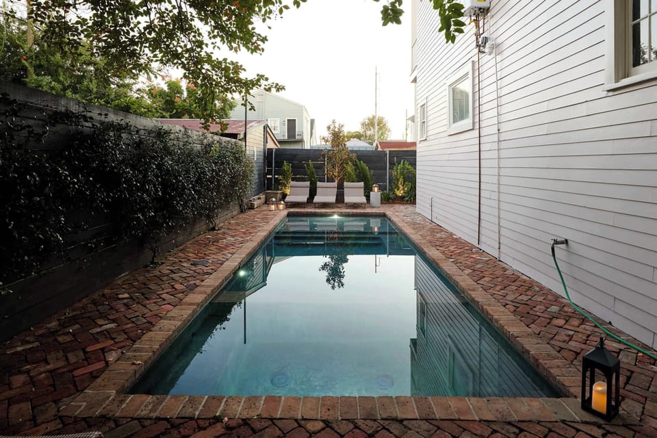 Relax by the Pool | Heated Spa & Lounge Seating