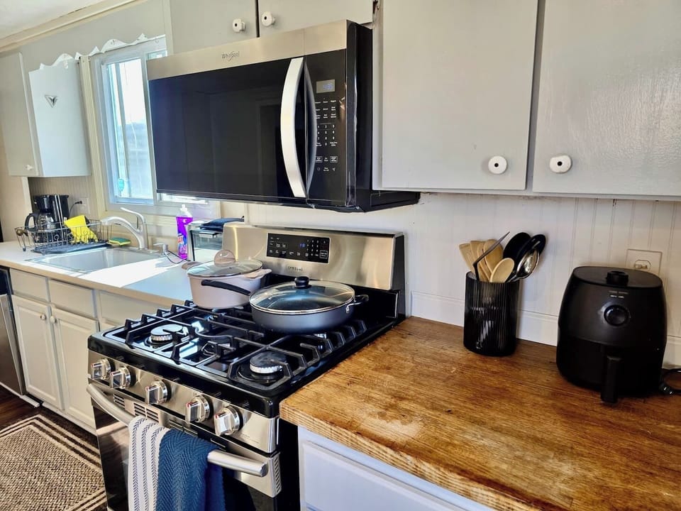 Fully stocked with cookware, utensils, and all the essentials to make your stay comfortable and convenient