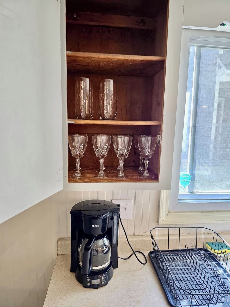 Fully equipped kitchen with stainless steel appliances.