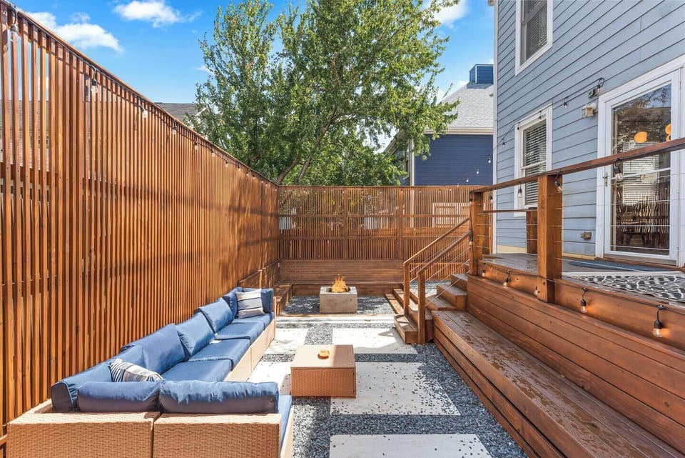 Covered patio area protects from sun and light rain, extending your living space
