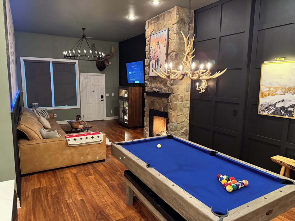 Enjoy a game of pool by the fire