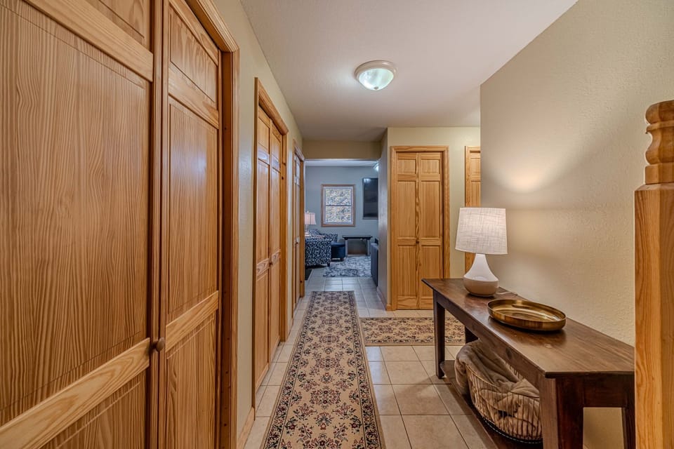 Basement Hall to Game Room and Basement Bedroom