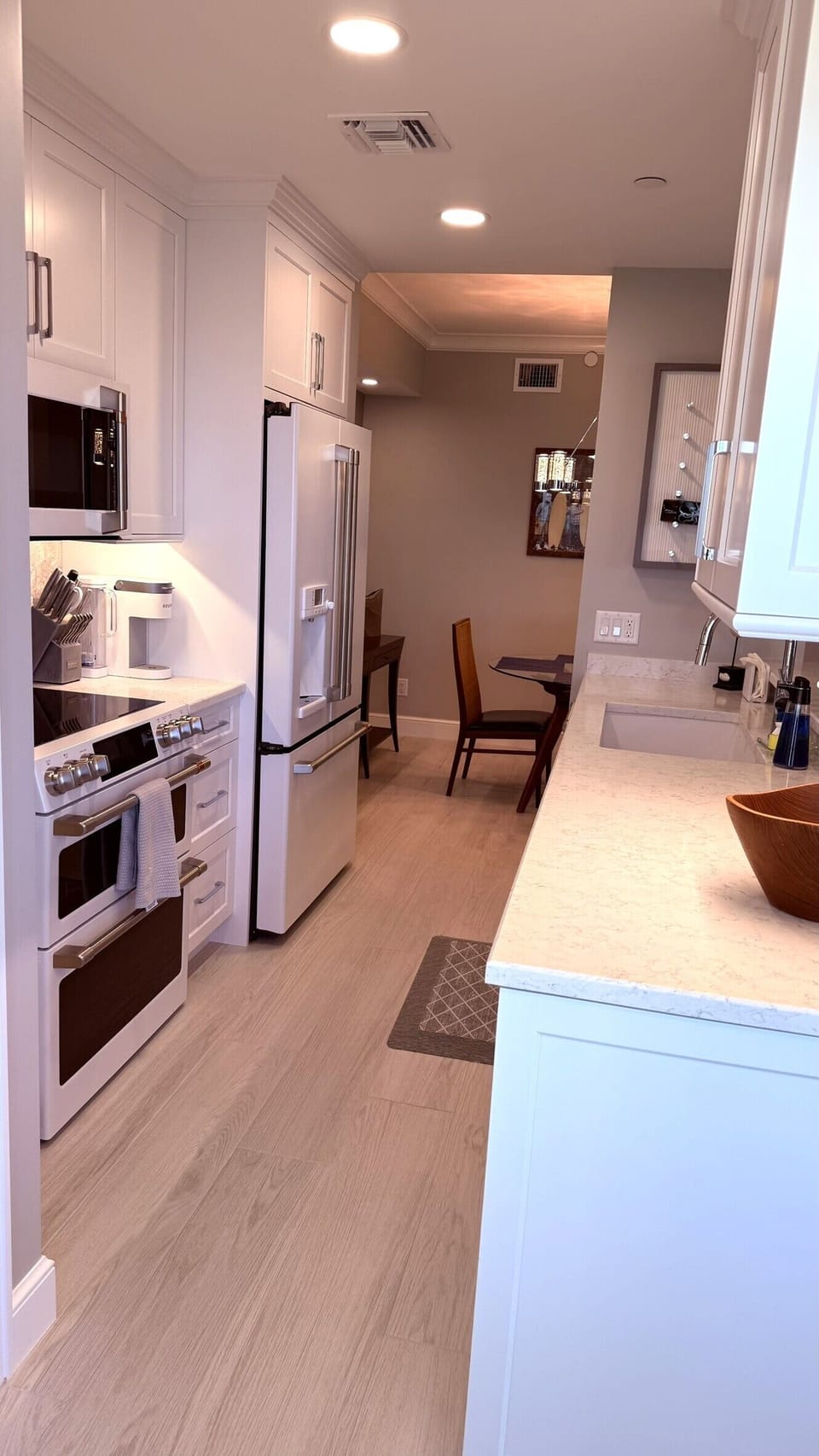 Kitchen - stove/microwave, refrigerator side