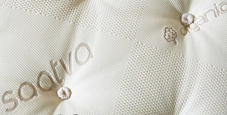 Organic Saatva mattress + organic bedding for a peaceful night.