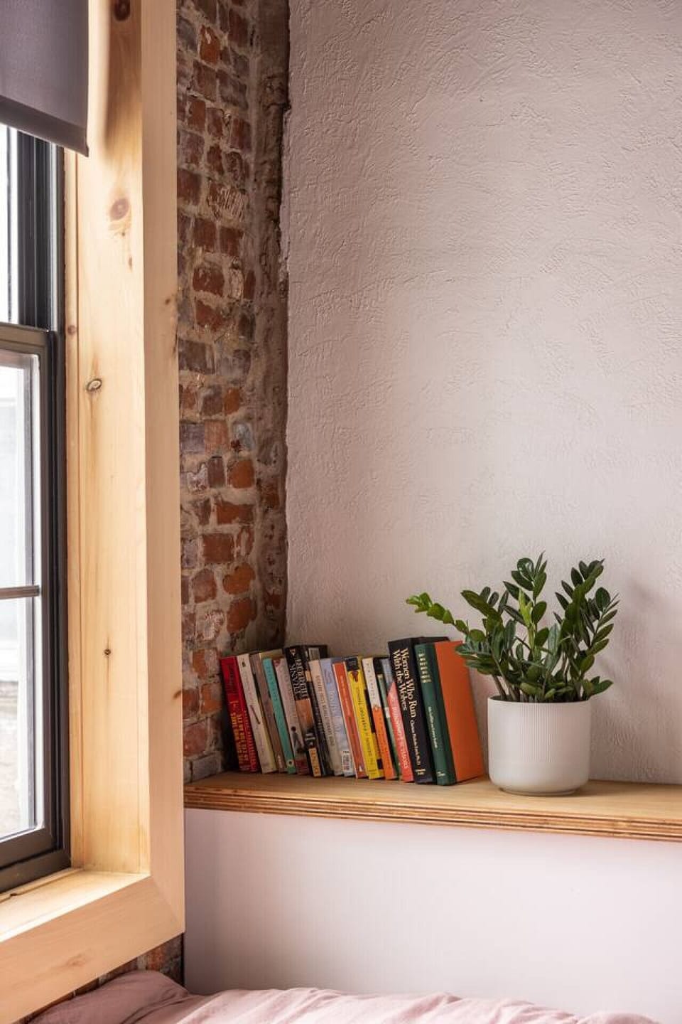 The 3rd bedroom upstairs is a perfect reading nook for stormy east coast days.