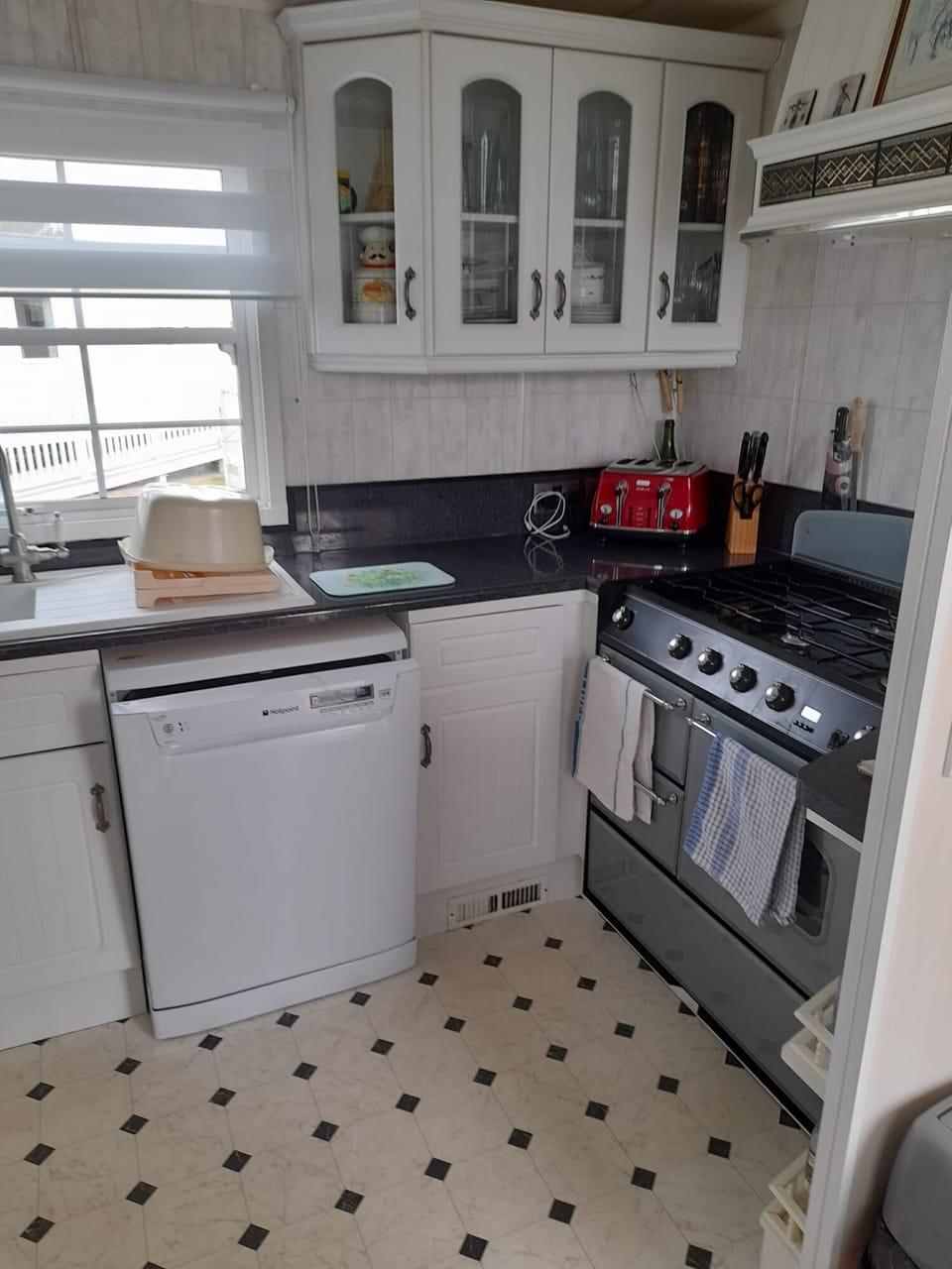 Bright kitchen with appliances to use