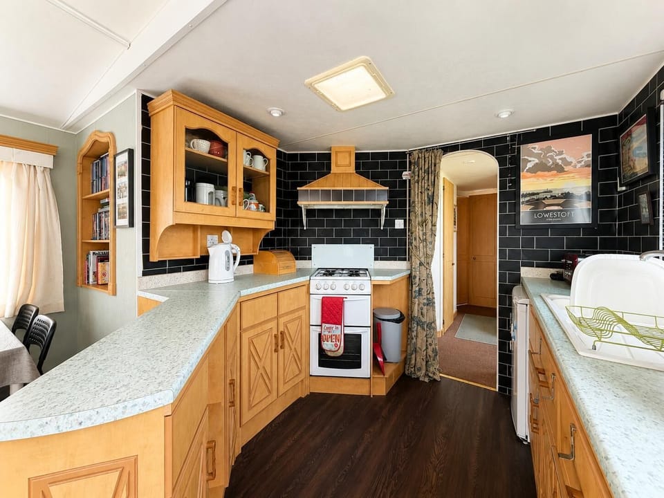 The kitchen with ample storage is the ideal place to prepare the family favourites. Its the perfect place to start your day with a fresh cup of coffee.