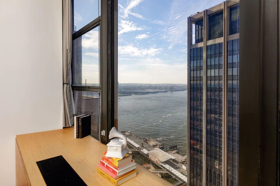 Sip coffee by the window while waterfront views glow.