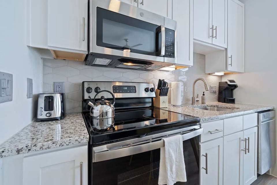 Cook with ease using stainless appliances and generous granite counters.