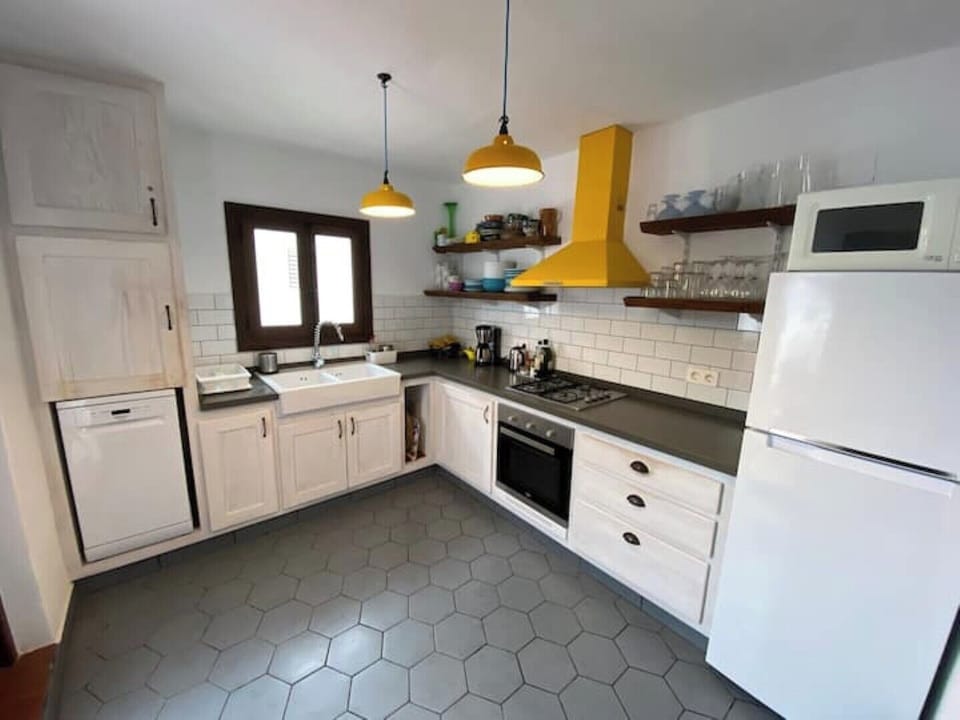 Our handbuilt kitchen is fully equipped for entertaining.